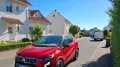 Mitsubishi Fast Neu,und ziemlich Rot, mit schwarzem D...
