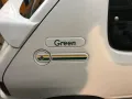 Peugeot 205 Green - kleiner weißer Löwe