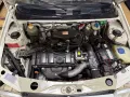 Peugeot 205 Green - kleiner weißer Löwe