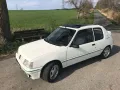 Peugeot 205 Green - kleiner weißer Löwe