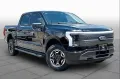 Ford F 150 Lightning XLT 2025 schwarz im Vorlauf