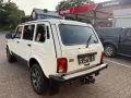 Lada Niva Luxus Klima 5 Türer, Mike Sanders