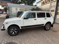 Lada Niva Luxus Klima 5 Türer, Mike Sanders