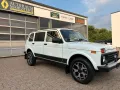 Lada Niva Luxus Klima 5 Türer, Mike Sanders