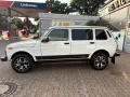 Lada Niva Luxus Klima 5 Türer, Mike Sanders